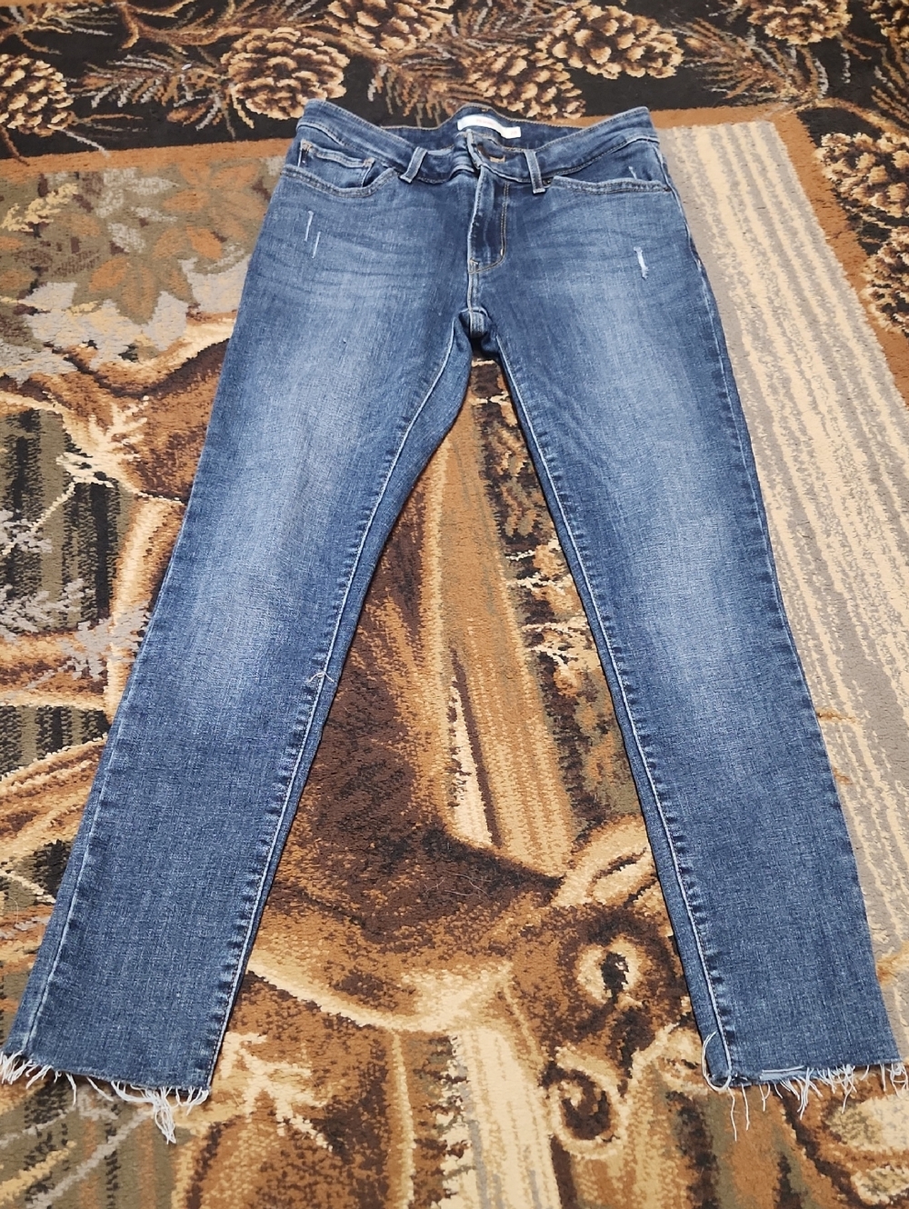 Mid-Blue Skinny Jeans with Frayed Hem
